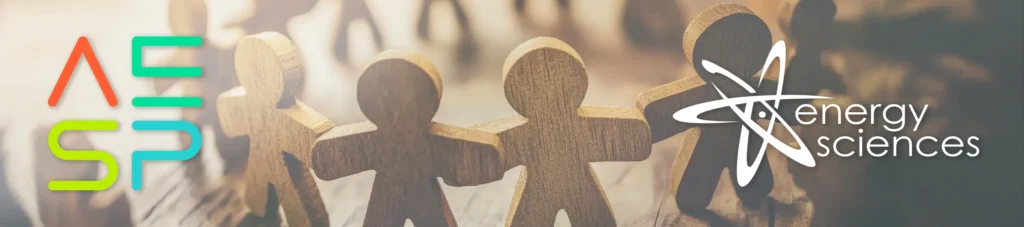 The AESP and Energy Sciences logos appear over a blurred background of wooden paper doll cutouts holding hands in a row.
